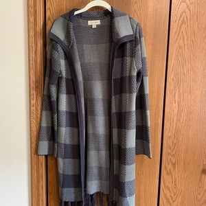 Open front sweater with fringe